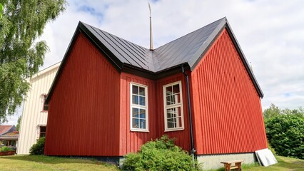 sur les bords du lac Siljan en Suède, église de Rättvik et maisons anciennes en bois