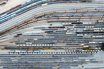 Cargo trains close-up. Aerial view of colorful freight trains on the railway station.
