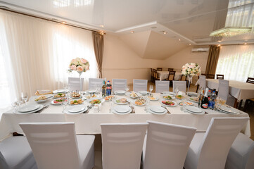 Festive table set with food and drinks.
