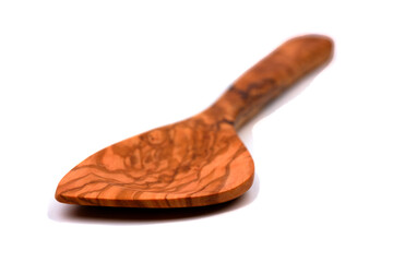 wooden spoon isolated on white background, real shadows, olive wood