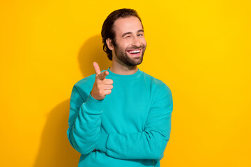 Photo of blinking eye young positive celebrity brunet hair guy finger directing you cool atmosphere...
