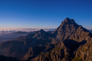 Plakat Monviso (3841) and Viso Mozzo (3015 m), the highest mountains in the western Alps, taken at dawn on a summer day from Mount Meidassa. Italian Alps.