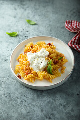 Pasta with tomatoes and fresh cheese