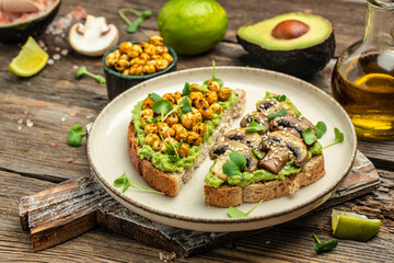 vegetarian sandwiches with avocado guacamole, chickpeas and mushrooms,