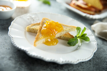 Fresh toast with orange marmalade