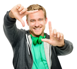 PNG of a handsome young man standing alone in the studio and using his hands to frame his face isolated on a PNG background.