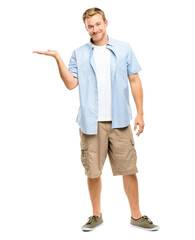A handsome young man standing alone in the studio and showing a promotion isolated on a PNG...