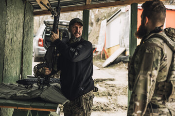 New soldier in a military camp learning to use rifle