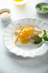 Fresh toast with orange marmalade