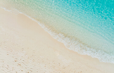 The ecology with Waves on the beach as a background. Beautiful natural background at the summer time-above view