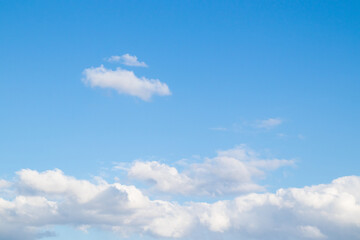 Spring blue sky with white clouds. Spring nature background