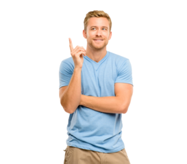 A handsome young man standing alone in the studio and pointing upwards isolated on a PNG background.