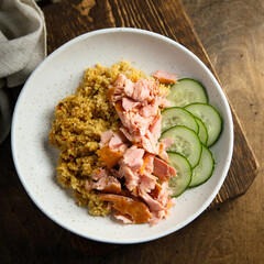 Healthy salmon bowl with spicy rice