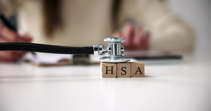 Hsa Health Savings Account Wooden Blocks Near Stethoscope