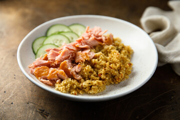 Healthy salmon bowl with spicy rice
