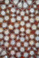 Mosaic on the wall of the ancient oriental palace. The skill of ancient architects. Elegant work