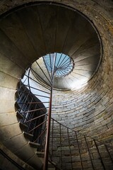 Spiral staircase in the tower of an ancient building. Castle or palace of the Middle Ages