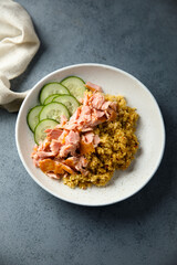 Healthy salmon bowl with spicy rice