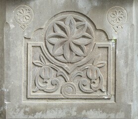 Bas-relief on a stone decoration of an ancient building.
