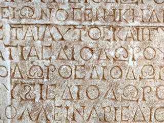 ancient Greek writing on the stone walls of the ancient city of Hierapolis