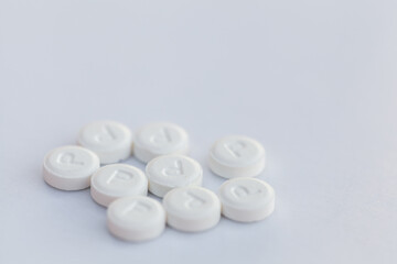 Dissolvable anti nausea pills on white