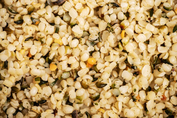 Hulled hemp seeds background, texture. Superfood, close-up