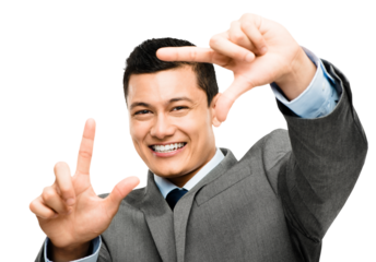 An asian businessman framing his face using his fingers isolated on a PNG background.