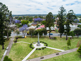 Burdekin Park cenotaph with remembrance day wreaths laid around it seen from aerial view
