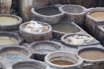 Fes, Morocco, Tannery aerial view Africa Old tanks of the Fez's tanneries with color paint for...