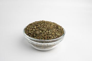 basil dry leaves in a glass dish