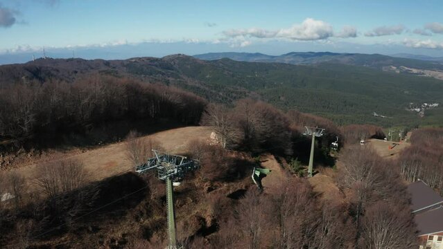 Mountain panorama with moving cable car 2