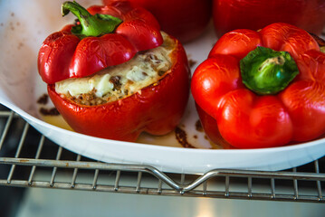 baked pepper with minced meat and rice, with the addition of mozzarella cheese