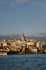 Fototapeta premium Turkish cityscape view of the Galata Tower on the European side of Istanbul, Turkey..