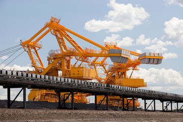 Coal moving machinery at Port Waratah in Newcastle which is the worlds largest coal port. Coal from open cast coal mines in the Hunter Valley is exported around the world from here