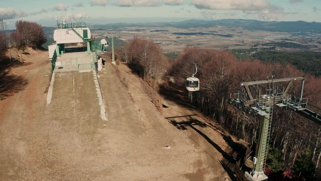 Mountain panorama with moving cable car 3