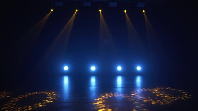 Stage lighting in the studio. Professional concert light on stage. Prerequisites for various projects. Lighting equipment in a nightclub. The concept of nightlife, music, entertainment and technology.
