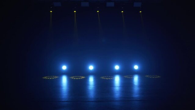 Stage lighting in the studio. Professional concert light on stage. Prerequisites for various projects. Lighting equipment in a nightclub. The concept of nightlife, music, entertainment and technology.