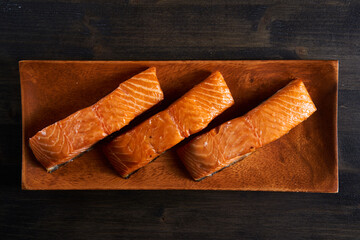 Smoked salmon on wooden board