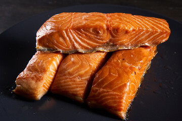 Smoked salmon on wooden board