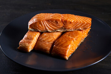 Smoked salmon on wooden board
