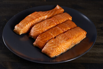 Smoked salmon on wooden board