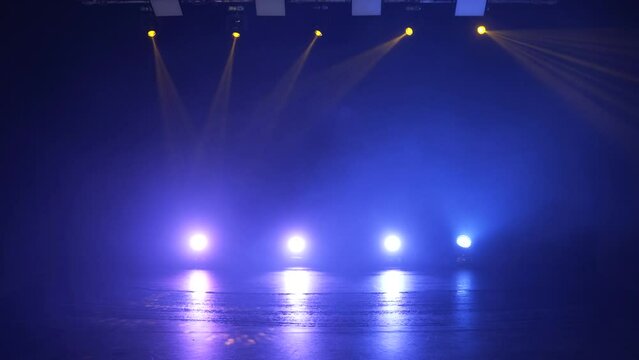 Stage lighting in the studio. Professional concert light on stage. Prerequisites for various projects. Lighting equipment in a nightclub. The concept of nightlife, music, entertainment and technology.