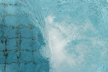 clear water jet with bubbles as background