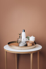 Bathroom table with spa products. Vertical photography with copy space.