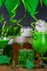 St Patrick's Day bar menu background. Set various golden, green beer glasses, different cocktails...