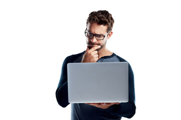 A handsome young man using a laptop and looking confused isolated on a PNG background.