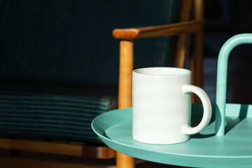White mug on the table. - 562098935