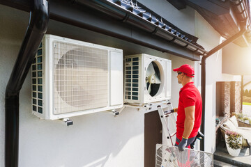 HVAC Technician Performing Air Condition and Heat Pump Units Maintenance - 562101562