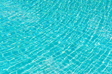 Fototapeta na wymiar summer pool water background with nobody, bermudas. photo of summer pool water background.