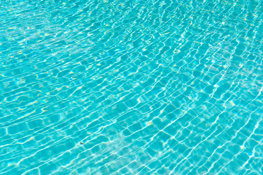 summer pool water background with nobody, bermudas. photo of summer pool water background.